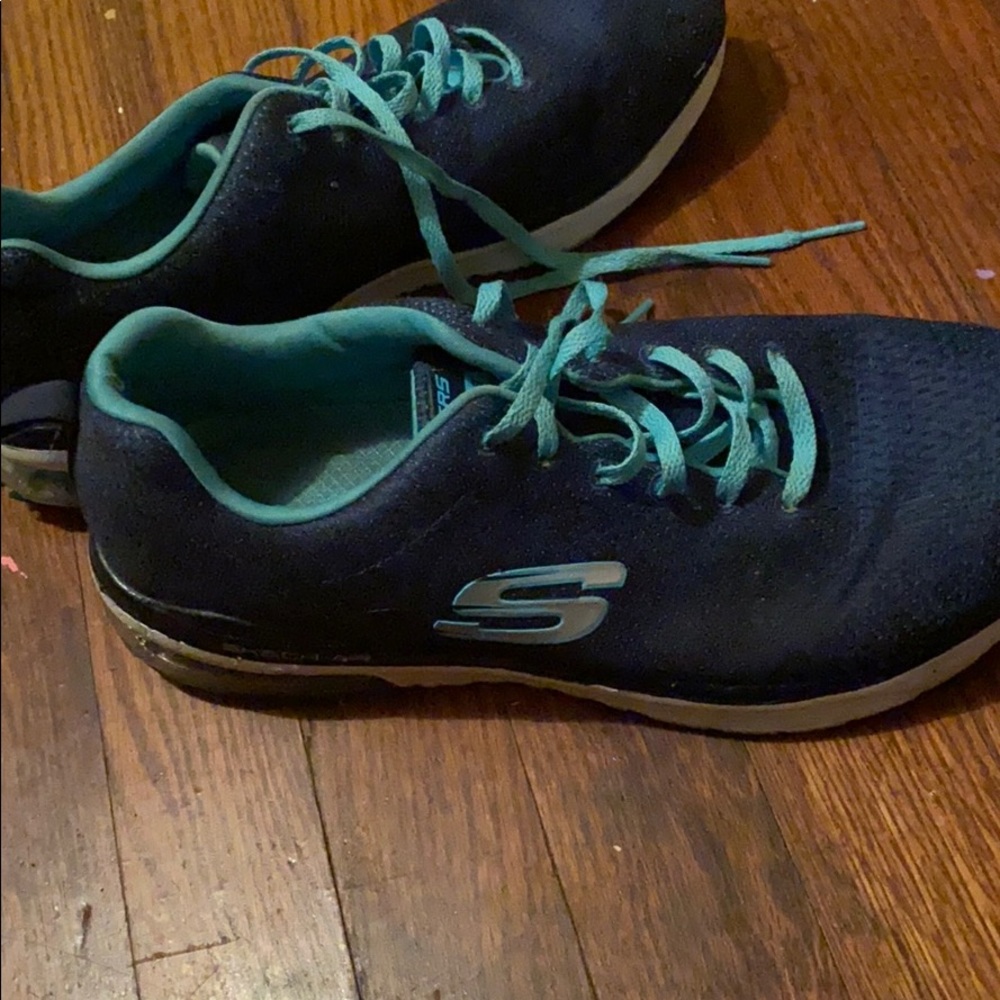 Blue sketchers tennis shoe